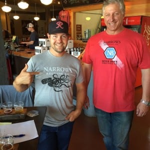 Ryan Moore (left) poses with Scott Wagner, one of the owners at Narrows Brewing Company, which brewed "Moore Hops Please," a dry-hopped amber ale named for the golfer. 