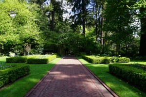 The Brick Walk and Teahouse at Lakewold Gardens features a gazebo-like structure where you can sit and enjoy the natural beauty around you.