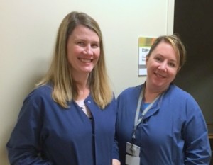 Dawn (left) and Amy are part of the friendly team that will greet you at the reception desk of Oly Ortho's Surgery Center.