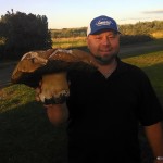 Chris Herrera with a very large King Bolete.  picture courtesy of Chris Herrera