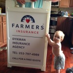 kaiden holding the sign