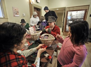 Volunteers at the Living History Museum engage visitors in activities of yore. Photo by Russ Carmack.