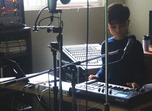 Playing music has helped Lucien manage with some of the challenges of autism. 