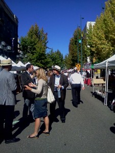 Locals enjoy the sunshine and peruse the vendors at the Tacoma Farmers Market on Broadway Street held every Thursday in the summer.