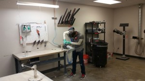 Technician Micah Buskah fabricates an IDEO brace for an out-of-state patient who is undergoing treatment for an IDEO device.