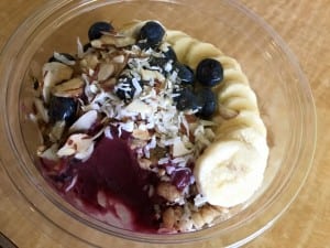 Acai berries are not only a super food but they also are a deliciously tart fruit that can masquerade as a dessert when topped with a display of fresh fruit and nuts, as seen here at Jamba Juice.