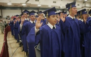 Cadets take the oath: I am a Washington Youth Academy Graduate. I am a person of integrity. I will not lie, cheat, steal, bully, or tolerate those who do. I resolve to live my life with honor.