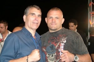 Brian Halquist (left) with former UFC world champion Chuck Liddell (right).