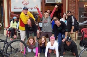 Bike and brew enthusiasts pose outside of Tacoma Brewing Company. Photo credit: Ron Swarner.