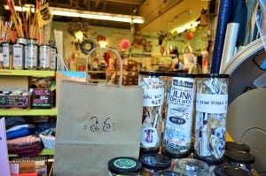 Haunted guitars, old-school projectors and vintage typewriters are among the trappings curious crafters will find at Tacoma’s downtown creative reuse center. Photo credit: Mariah Beckman.