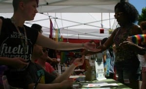 Oasis Youth Center reaches out to the community during Out In the Park, one of the events that takes place during the Tacoma Pride Festival. Photo courtesy of Oasis Youth Center. 