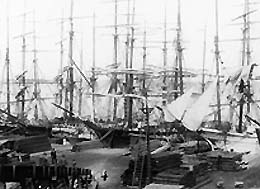 Sailing vessels loading lumber, Tacoma waterfront, ca. 1887. Photo credit: E. A. Lynn, courtesy UW Special Collections (Neg.UW5367).