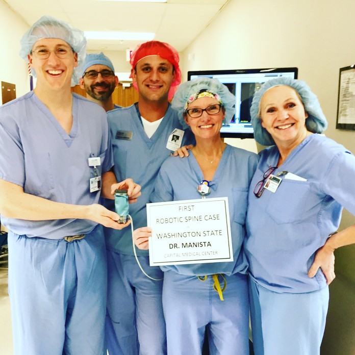 Dr Manista and Team Oly Ortho First Robotic Spine Surgery Oly Ortho, Dr. Manista and team