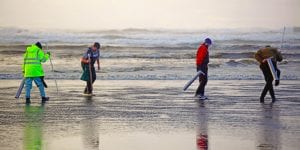 clam diggers on beach